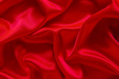 Kırmızı bez dalga arkaplan dokusu.