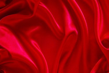 Kırmızı bez dalga arkaplan dokusu.