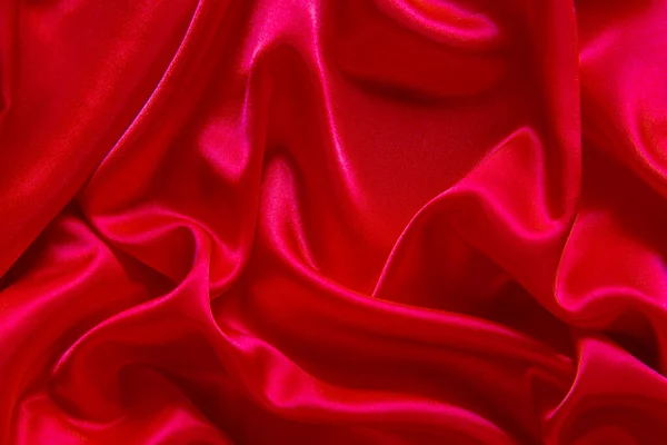 赤い布の波の背景のテクスチャ — ストック写真