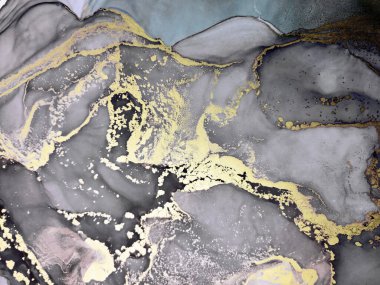 Black and Gold Alcohol Ink. Eastern Paint. Bright Gouache. Concept Golden Alcohol ink. Unreal Background. Dirty Watercolor paint. Gold Divorces on Black.
