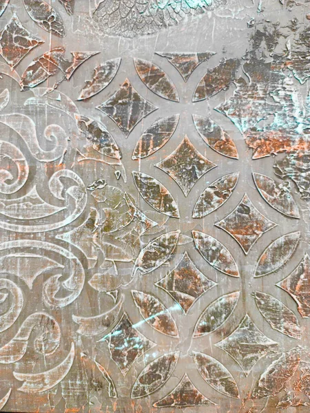 Eski dekoratif duvar süsü. Geometrik Arap Yardım Örgütü. Sefil Vintage Arabesk Şablonu. Grunge eski püskü süs. Duvarda kirli alçı deseni var. İtalyan Antika Duvar Kağıdı.