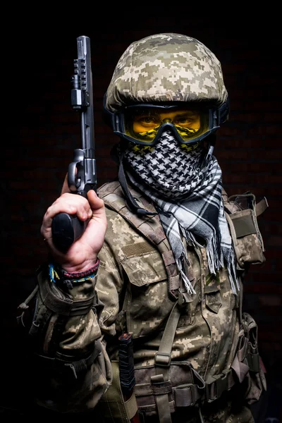 Portrait of soldier with gun — Stock Photo, Image