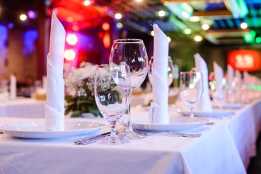 Wine glasses on served table in a restaurant