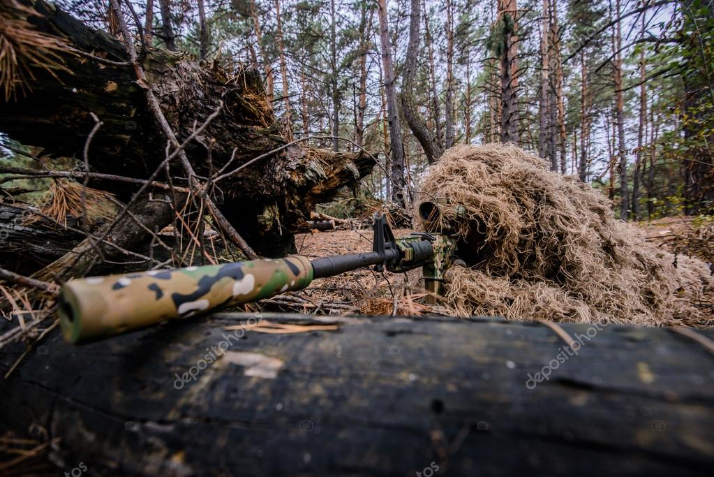 camouflaged sniper rifle with optic sight Stock Photo - Alamy