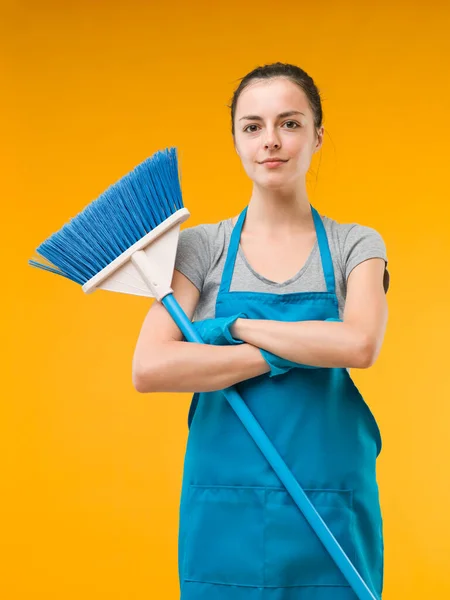 Happy Caucasian Woman Standing Arms Crossed Holding Broom Yellow Background — Stock Photo, Image