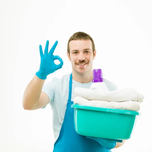 Portrait Caucasian Man Holding Basket Laundry Smiling Showing Sign White — Stock Photo, Image