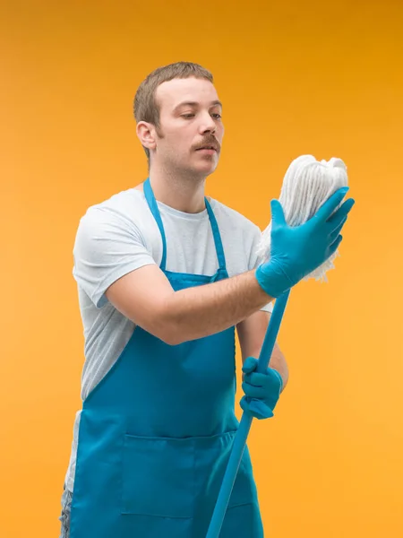 Male Cleaner Flirting Mop Yellow Background — Stock Photo, Image