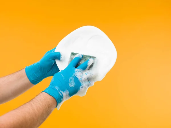 Hands Wearing Rubber Gloves Washing Dish Detergent Yellow Background — Stock Photo, Image