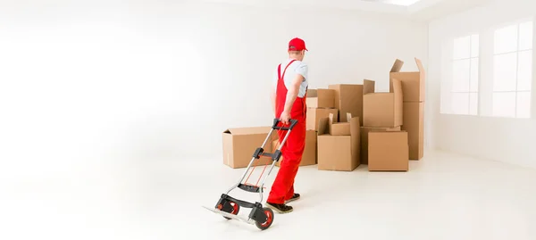 Caucasian Deliveryman Red Uniform Holding Hand Truck Getting Ready Load — Stock Photo, Image