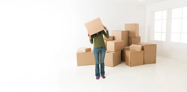Woman Moving New House Having Fun Hiding Her Head Cardboard — Stock Photo, Image
