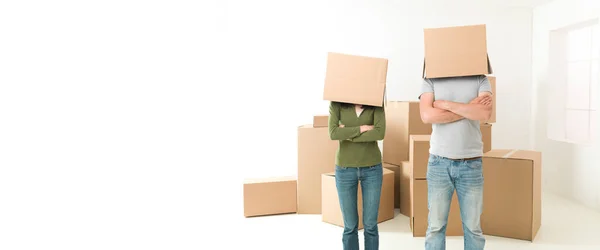 Couple Boxes Heads Standing New House Arms Crossed Chests — Stock Photo, Image