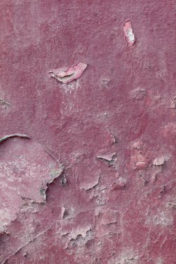 Eski duvar dokusu pembe ve derisi soyulmuş.