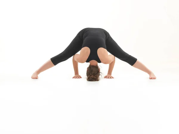 Young Blonde Woman Demonstrating Yoga Pose Bend Forward Face Obscured — Stock Photo, Image