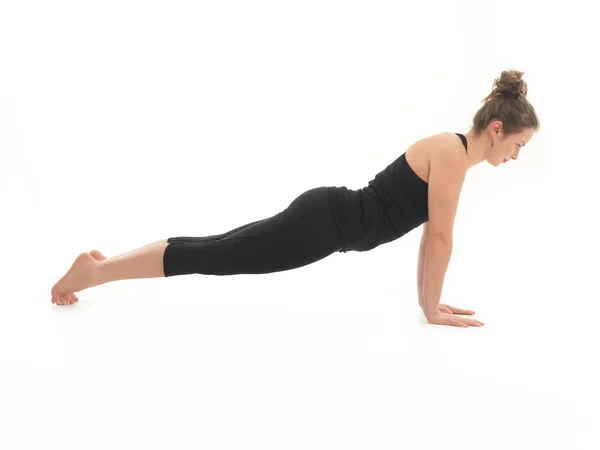 Vista Laterale Una Donna Ypung Postura Yoga Vestita Nero Sfondo — Foto Stock
