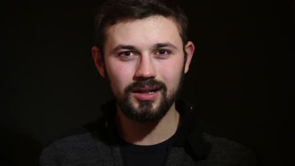 Set of handsome emotional man over dark background — Stock Video