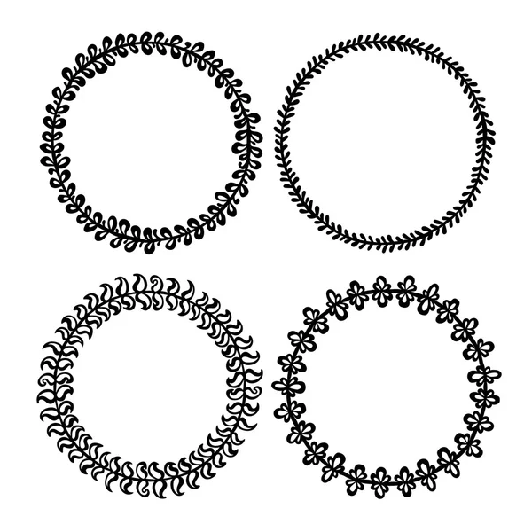 Set of hand drawn decorative frames. A set of four decorative frames. Set of decorative doodle wreaths made of branches. Set number two. Black background. Black and white. — Stock Vector