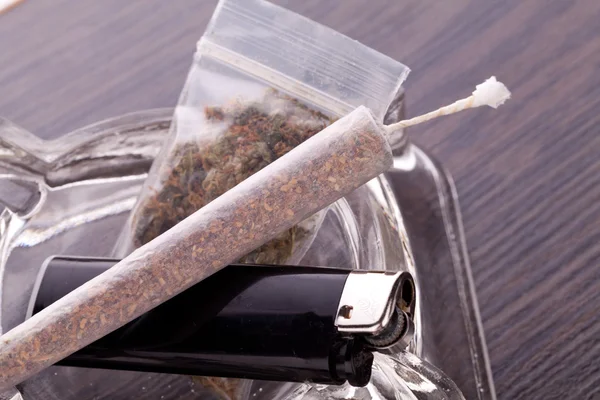 Close up of marijuana and smoking paraphernalia Stock Picture