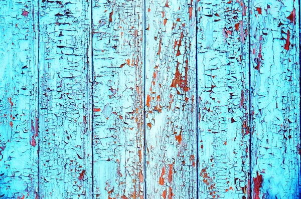 Grungy houten planken muur textuur met blauwe verf peeling — Stockfoto