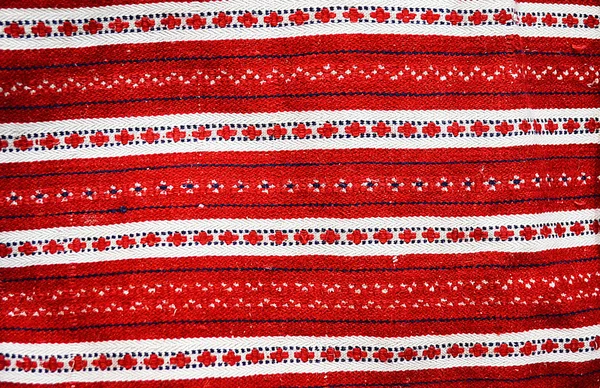 Randig färgglad textil bakgrund med folk mönster — Stockfoto