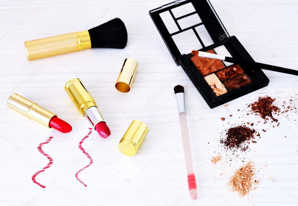 Varied cosmetics on the white table, selective focus