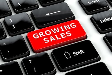 Ekonomi kavramı: satış bilgisayar klavye arka plan üzerinde büyüyen