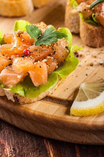 Canape with smoked salmon — Stock Photo, Image