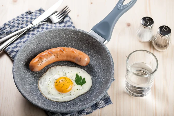 Fried egg and sausage — Stock Photo, Image