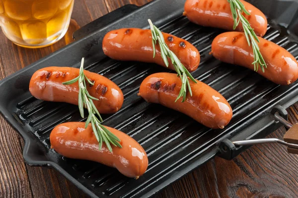 Grilled sausages and beer — Stock Photo, Image