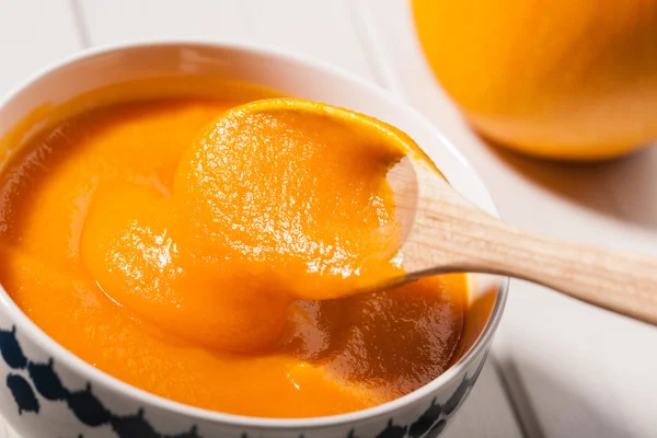 Close up of pumpkin soup in a bowl — Stock Photo, Image