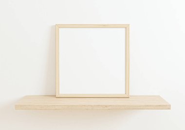 Single 10x10 Square Wooden Frame mockup on wooden shelf and white wall. One empty poster frame mockup on wooden shelf and white background. 3D Rendering