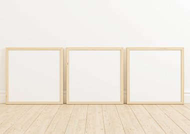 Triple 10x10 Square Wooden Frame mockup on wooden floor and white wall. Three empty poster frame mockup on wooden floor and white background. 3D Rendering