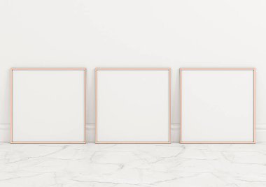 Triple 10x10 Square Rose Gold Frame mockup on marble floor and white wall. Three empty poster frame mockup on marble floor and white background. 3D Rendering