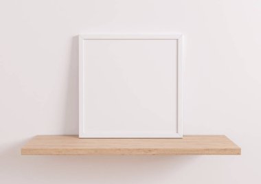 Single 10x10 Square White Frame mockup on wooden shelf and white wall. One empty poster frame mockup on wooden shelf and white background. 3D Rendering
