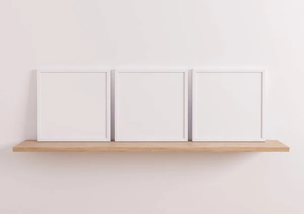 Triple 10X10 Square White Frame Mockup Wooden Shelf White Wall — Foto Stock