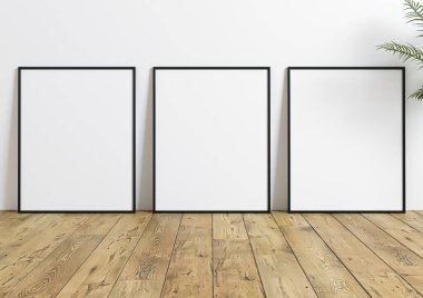 Ahşap zeminde 8x10 dikey siyah çerçeve modeli ve bir bitki. Ahşap zeminde ve beyaz arka planda boş resim çerçevesi modeli. 3B Hazırlama. 