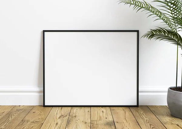 Single 8x10 horizontal Black Frame mockup on wooden floor and a plant in a vase. Empty picture frame mockup on wooden floor and white background. 3D Rendering.