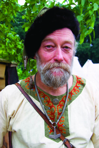 man wearing medieval costume 
