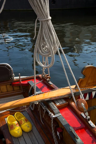 The wooden fishing boat details on the water in the Netherlands
