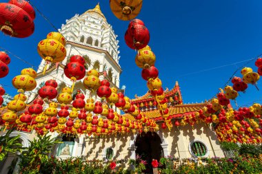 Kek Lok Si Chinese Temple decorated with Chinese paper lanterns for the Chinese New Year. Kek Lok Si Temple is located near Georgetown, Penang, Malaysia. clipart