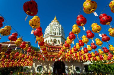 Kek Lok Si Chinese Temple decorated with Chinese paper lanterns for the Chinese New Year. Kek Lok Si Temple is located near Georgetown, Penang, Malaysia. clipart