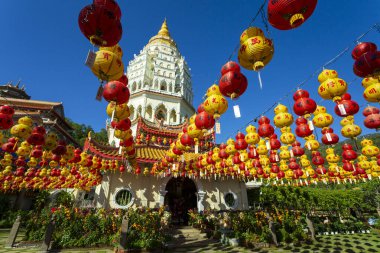 Kek Lok Si Chinese Temple decorated with Chinese paper lanterns for the Chinese New Year. Kek Lok Si Temple is located near Georgetown, Penang, Malaysia. clipart