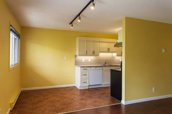 New renovation apartment rental kitchen with new appliances in a modern condo house with dining room.