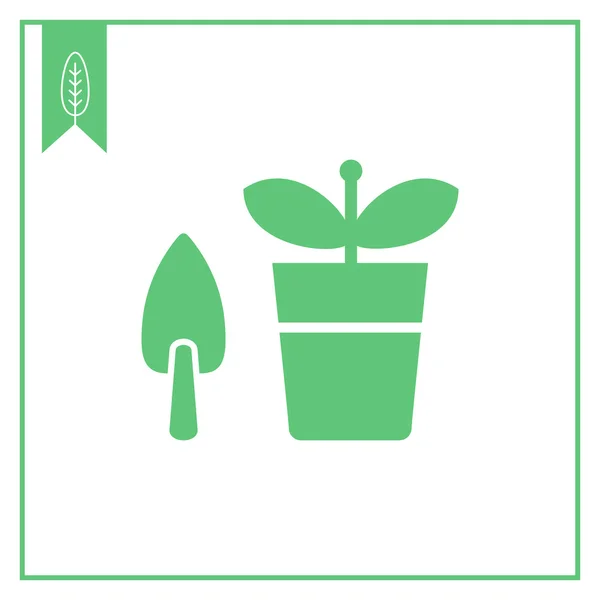 Planta en maceta con pala — Vector de stock