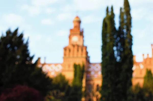 Blurred silhouette of ancient building of Residence of Bukovinian and Dalmatian Metropolitans (Chernivtsi National University).UNESCO World Heritage Site. Abstract background, blurred background.