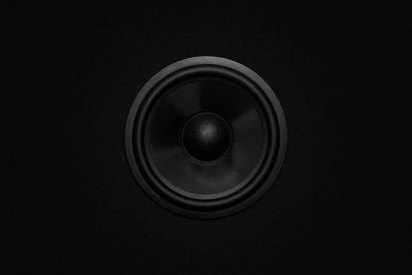 Music speaker on black background. Sound