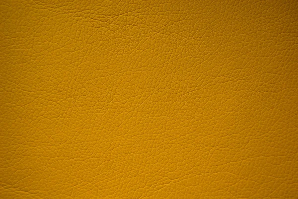 Fundo textura de couro amarelo — Fotografia de Stock