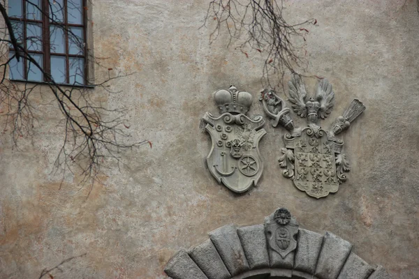 The coat of arms on the wall of the castle in Cesky Krumlov