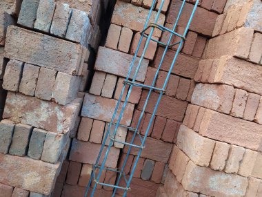 Fotoğraf arkaplanı veya şablon inşaatı için kil tuğlaların fotoğrafı