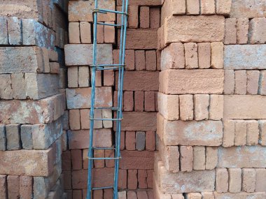 Fotoğraf arkaplanı veya şablon inşaatı için kil tuğlaların fotoğrafı