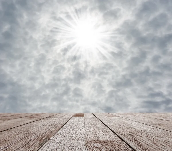 Wooden table top on cloud storm with sky for design — Stock Photo, Image